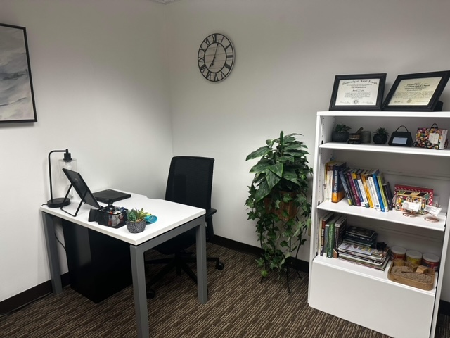 Welcoming seating area in the Thriving Journey Therapy office
