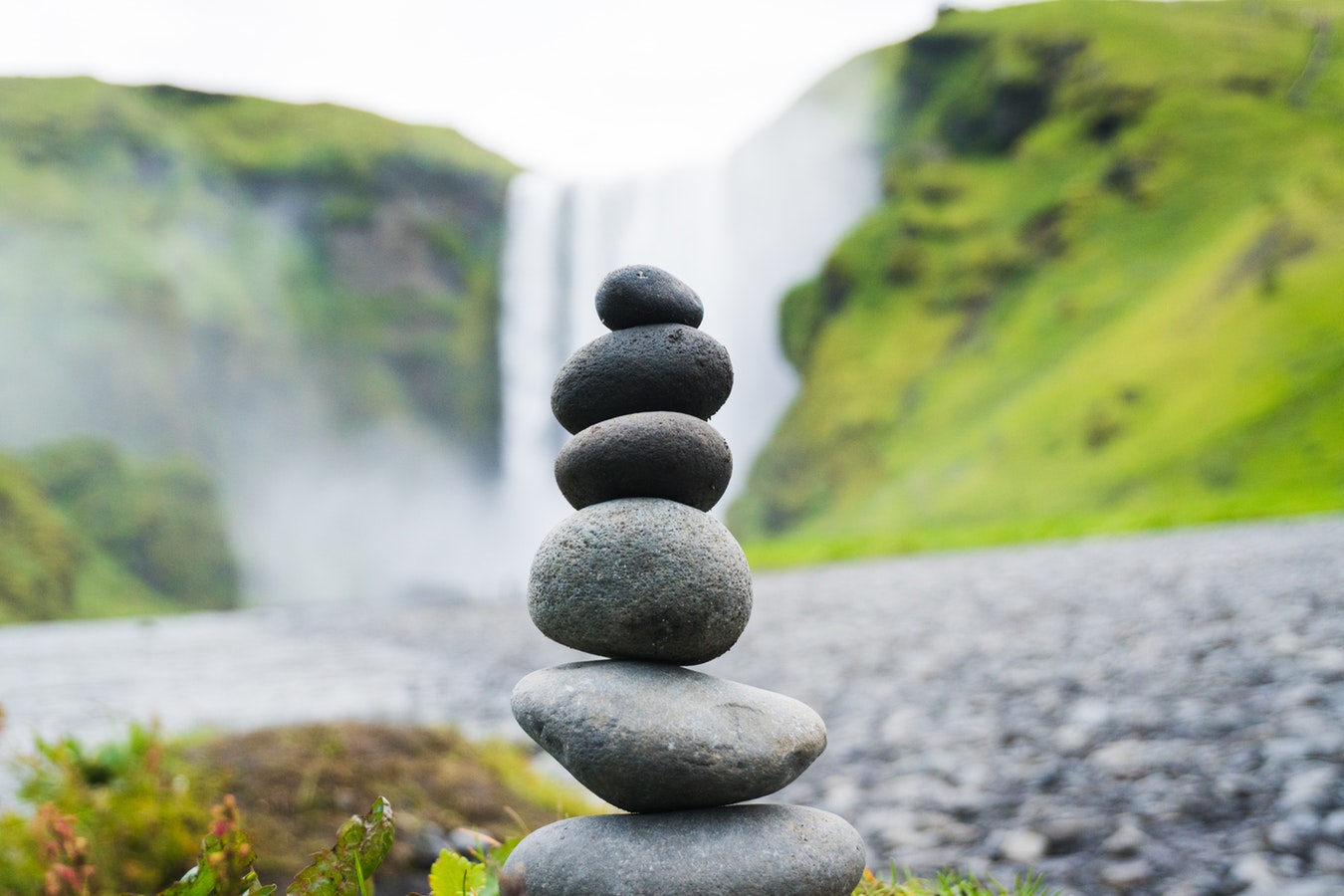 Stacked stones balanced on a beach